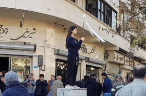 Vida Movahed protesting in Tehran, Iran